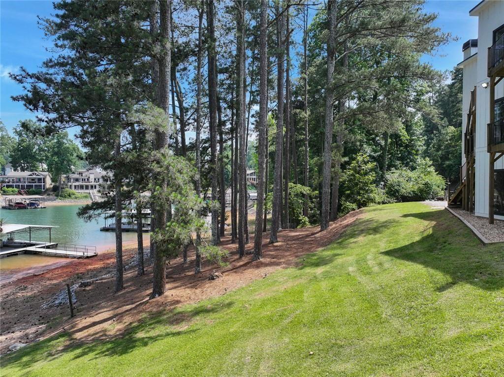 2040 Ridge Road Cumming, GA 30041 - Photo 4 of 52 a view of a backyard with a fountain