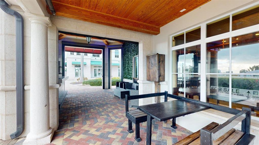 3983 Destination Drive, Unit 102 Osprey, FL 34229 - Photo 9 of 22 a view of a living room and dining room