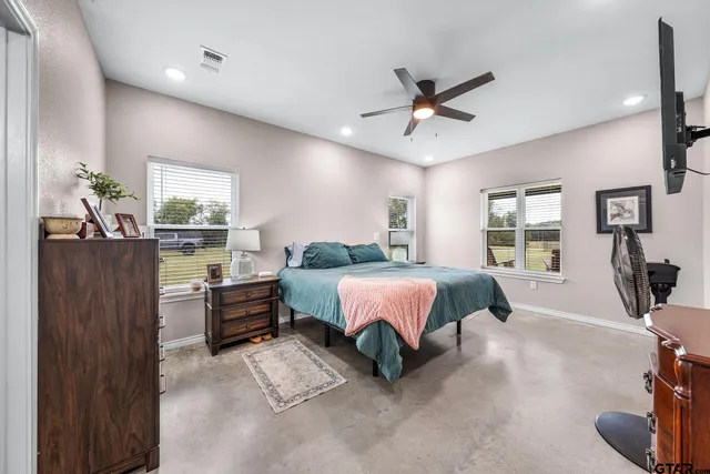 a view of a kitchen with a sink and cabinets