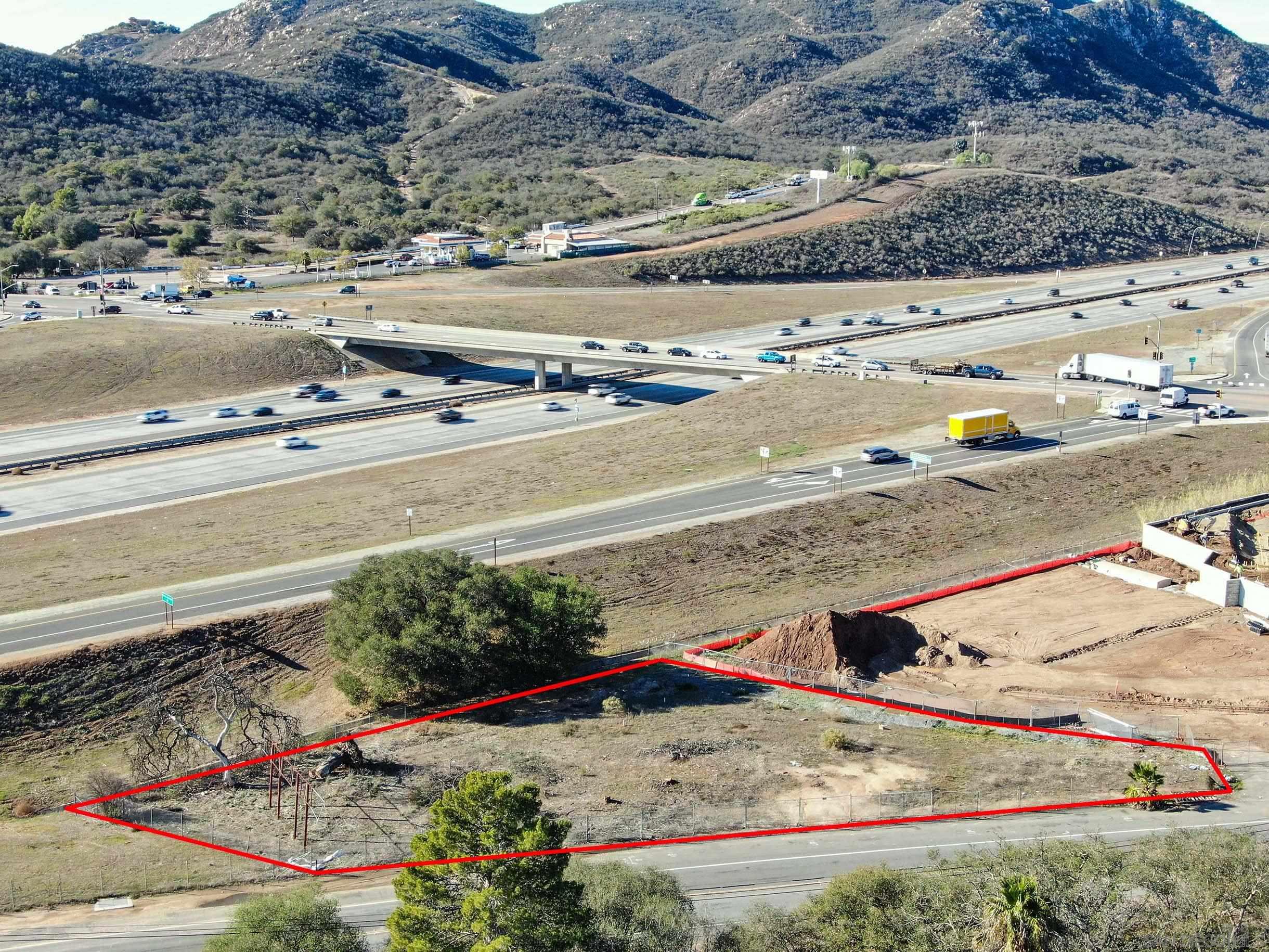 0 Mountain Meadow Road, Unit 31 32 33 Escondido, CA 92026 - Photo 11 of 20 a view of a parking space and a wooden bridge