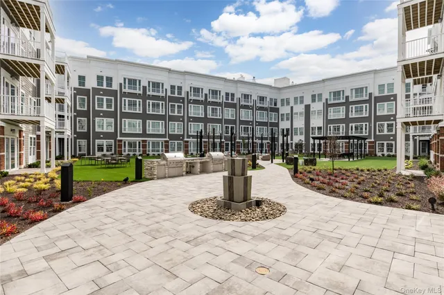 a view of a building with a yard