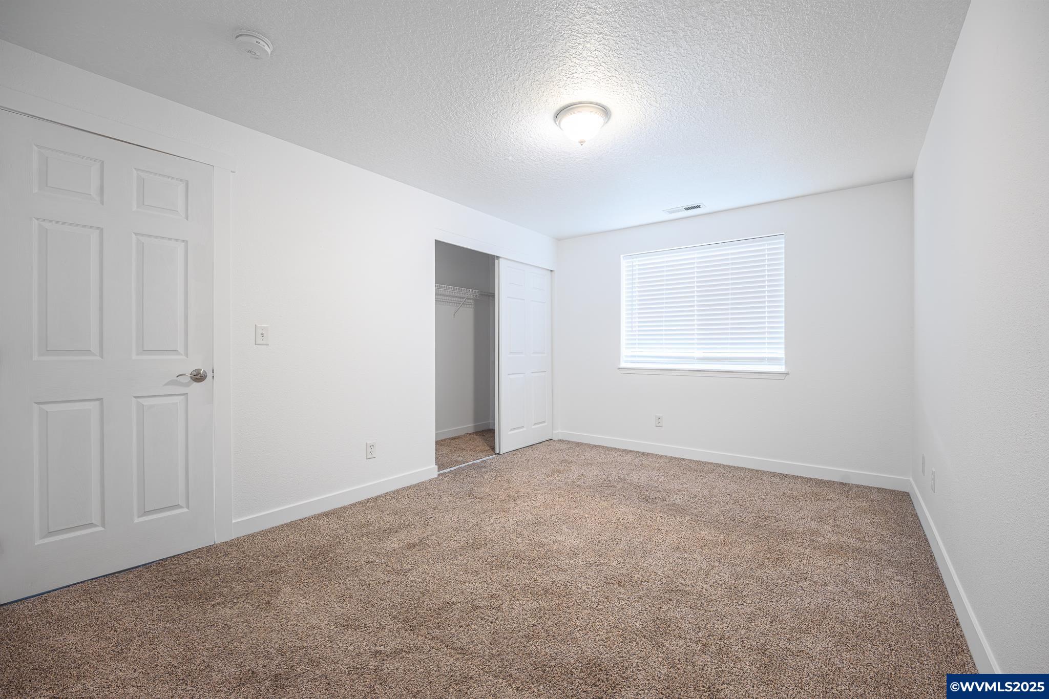1467 South 7th Street Independence, OR 97351 - Photo 23 of 31 an empty room with a window