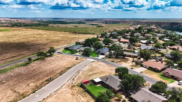 a view of an ocean and city