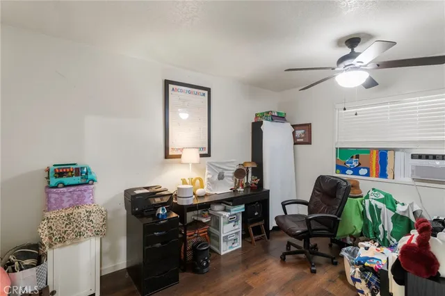 a room with furniture and a wooden floor