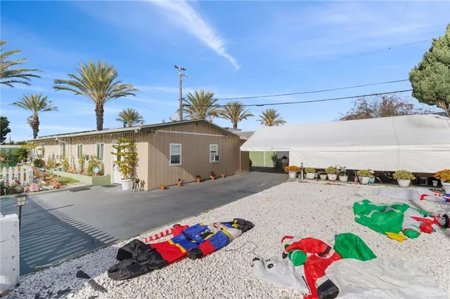 a front view of a house with outdoor space