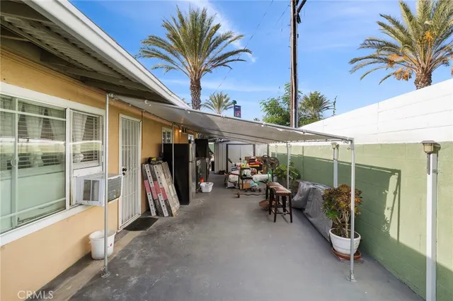 a view of a lake with houses in the back