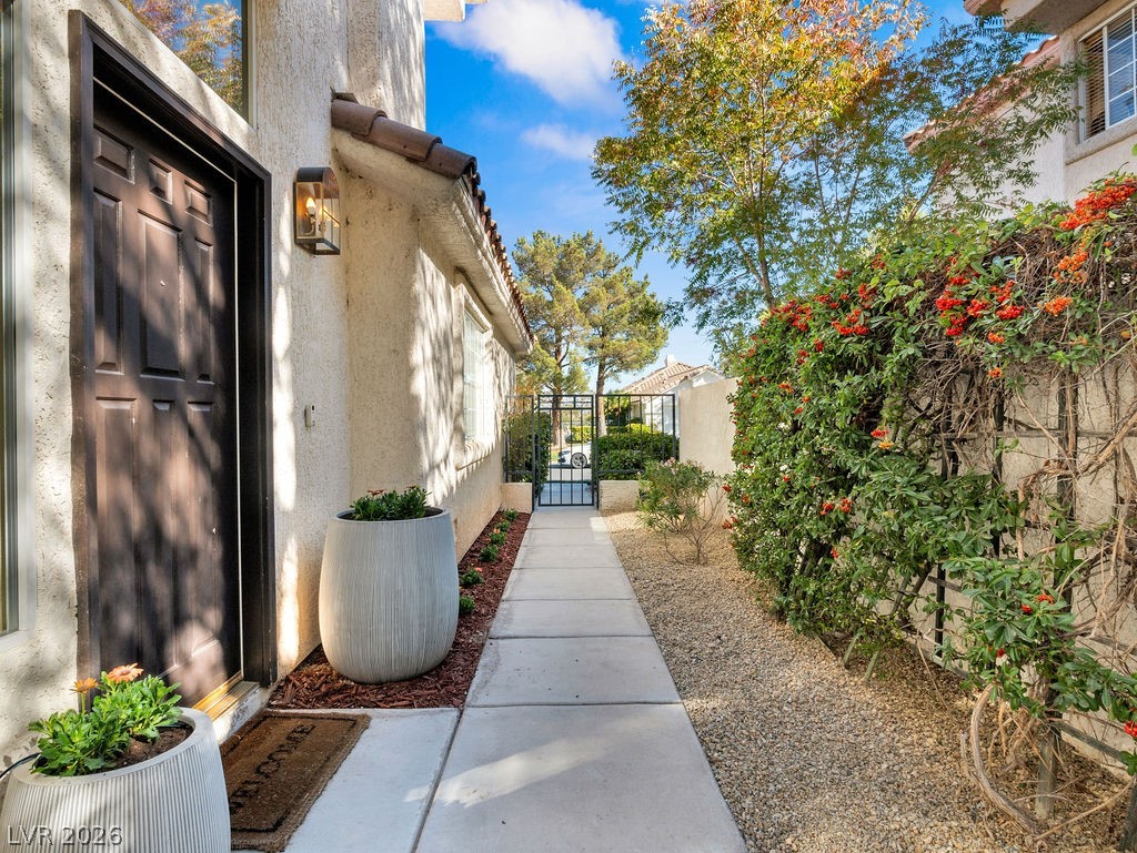9201 Eagle Ridge Drive Las Vegas, NV 89134 - Photo 13 of 35 Easy-care backyard, with patio space for relaxing or entertaining