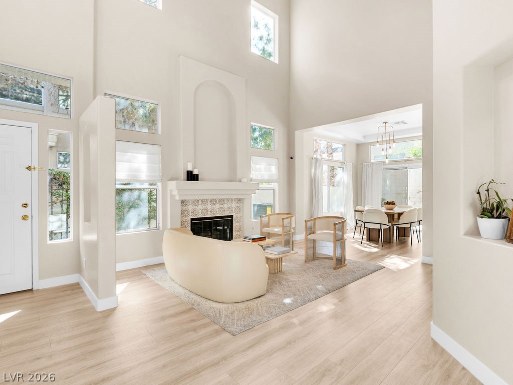 9201 Eagle Ridge Drive Las Vegas, NV 89134 - Photo 15 of 35 Bright, open living space with cozy fireplace
Spacious living room with vaulted ceilings.