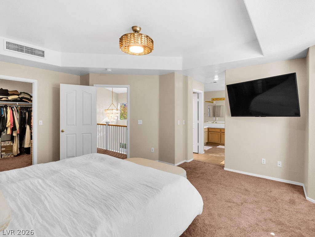 9201 Eagle Ridge Drive Las Vegas, NV 89134 - Photo 22 of 35 Large primary bedroom with walk-in closet.