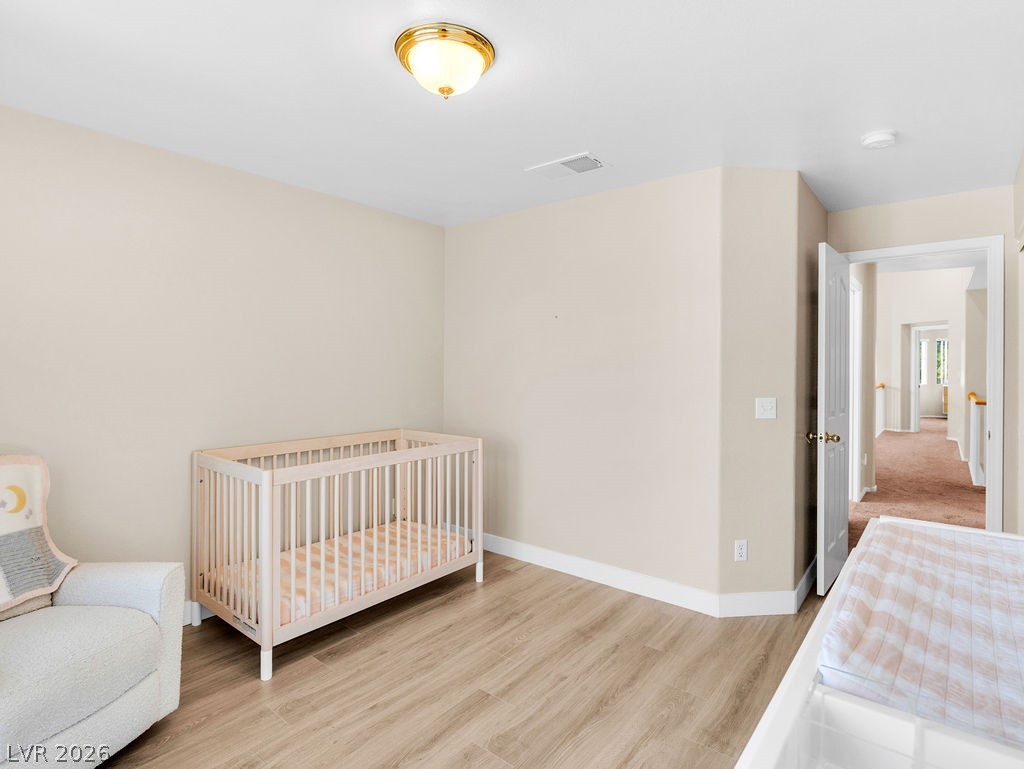 9201 Eagle Ridge Drive Las Vegas, NV 89134 - Photo 26 of 35 Light-filled bedroom ideal for guests or office