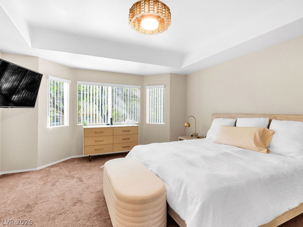 9201 Eagle Ridge Drive Las Vegas, NV 89134 - Photo 7 of 35 Spacious primary suite with abundant natural light.