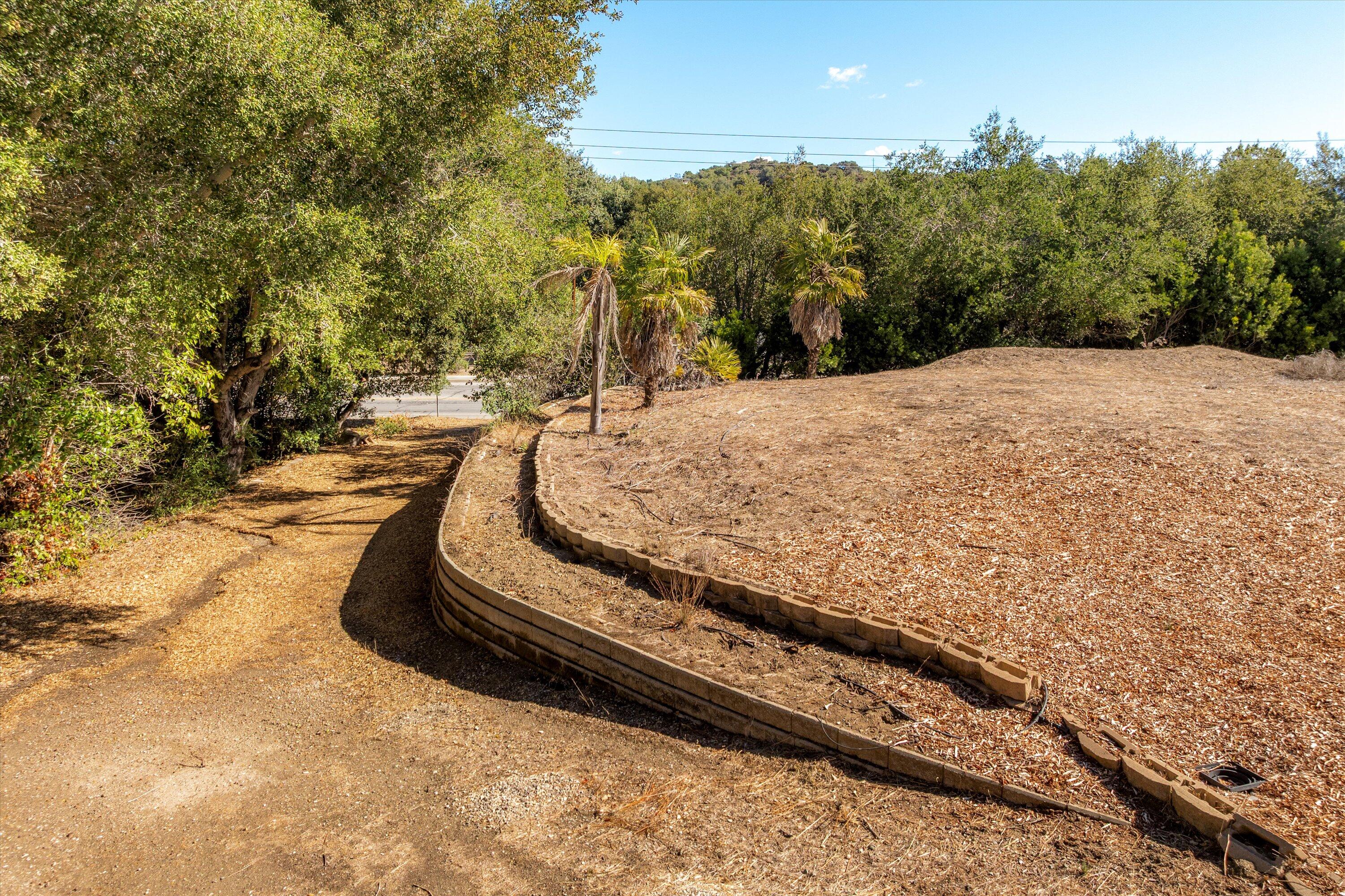 1999 Viborg Road Solvang, CA 93463 - Photo 12 of 13 a view of a backyard with wooden fence