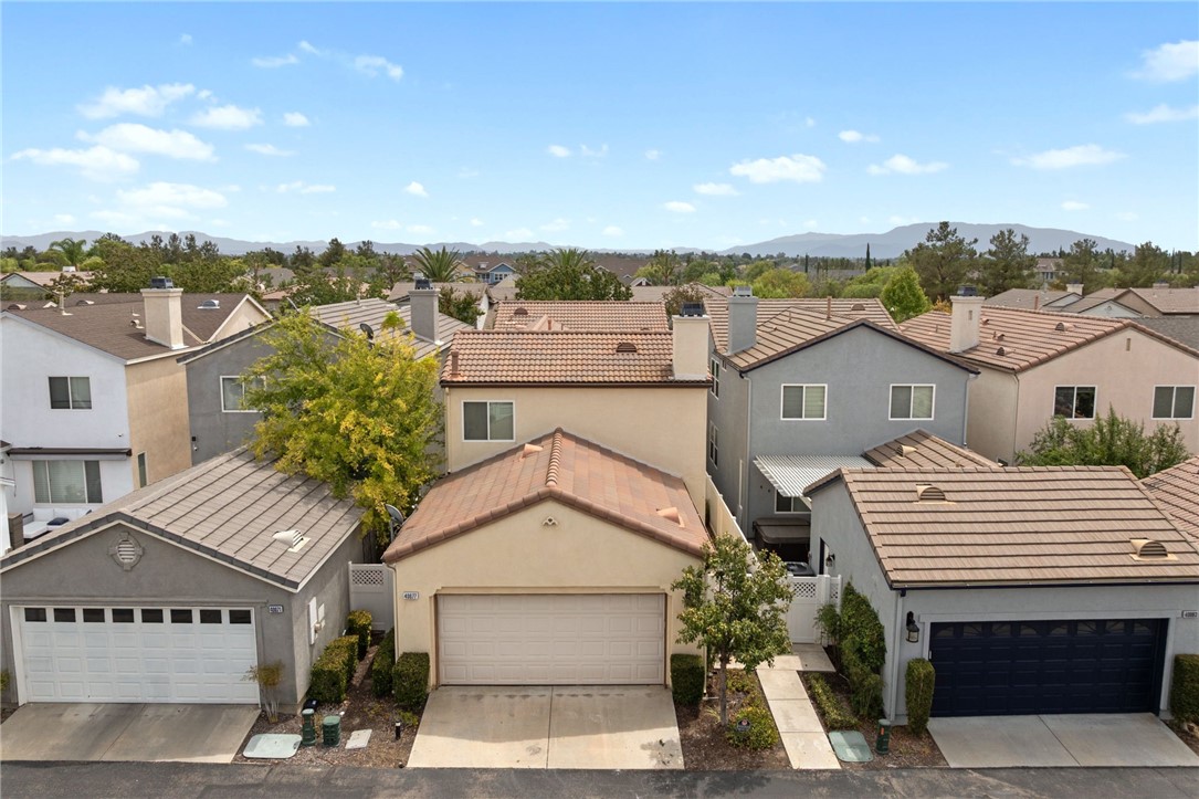 40077 Stowe Road Temecula, CA 92591 - Photo 23 of 58 Back of home showing garage located in private alley