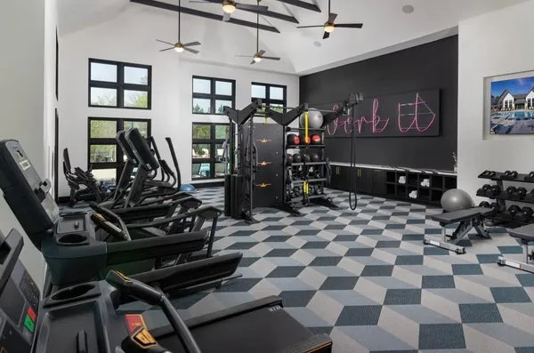 a view of a room with gym equipment