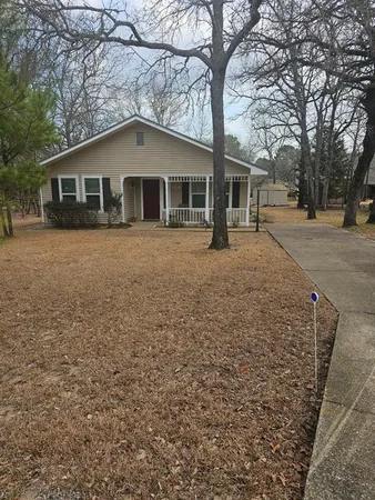 a house with trees in front of it