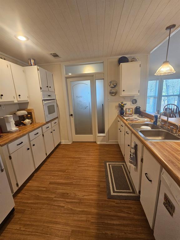 3347 Bandera Street Athens, TX 75752 - Photo 1 of 17 a kitchen with stainless steel appliances granite countertop a sink stove and refrigerator