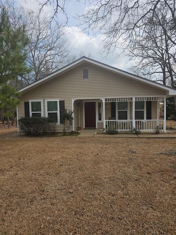 3347 Bandera Street Athens, TX 75752 - Photo 13 of 17 a house with trees in the background