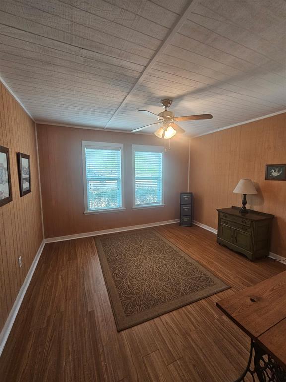 3347 Bandera Street Athens, TX 75752 - Photo 14 of 16 a living room with a couch wooden floor and a window