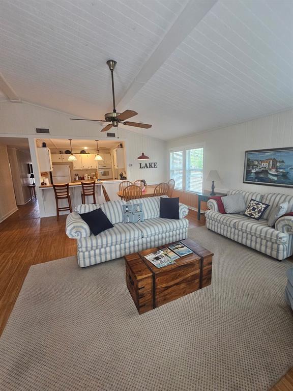 3347 Bandera Street Athens, TX 75752 - Photo 4 of 17 a living room with furniture and a chandelier