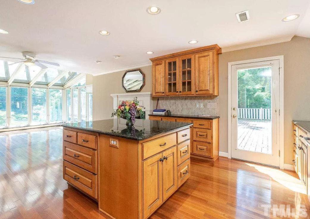 1508 Medfield Road Raleigh, NC 27607 - Photo 3 of 19 a kitchen with stainless steel appliances granite countertop a sink and cabinets