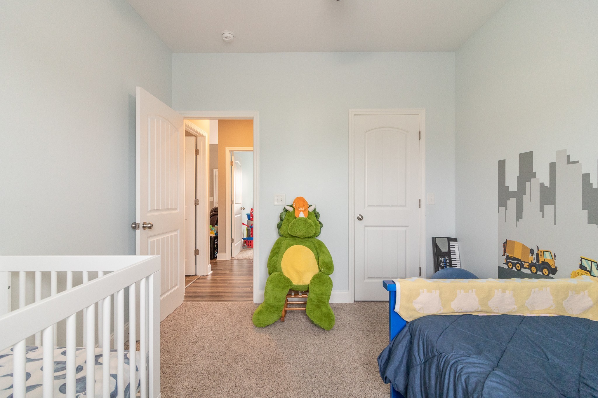 167 Fieldstone Lane Springfield, TN 37172 - Photo 18 of 36 a bed room with a bed and a chair