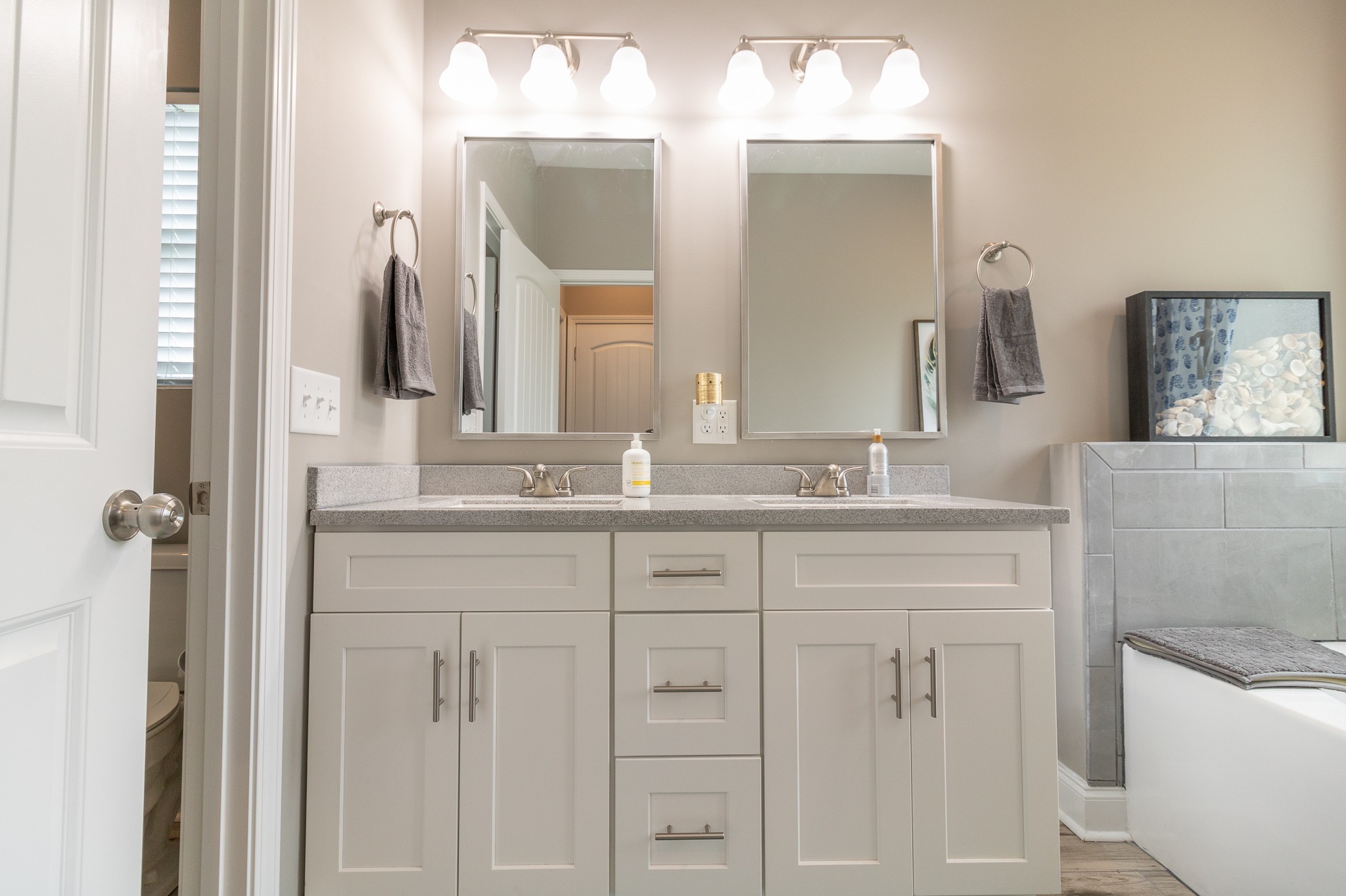 167 Fieldstone Lane Springfield, TN 37172 - Photo 23 of 36 a bathroom with a double vanity sink and a mirror