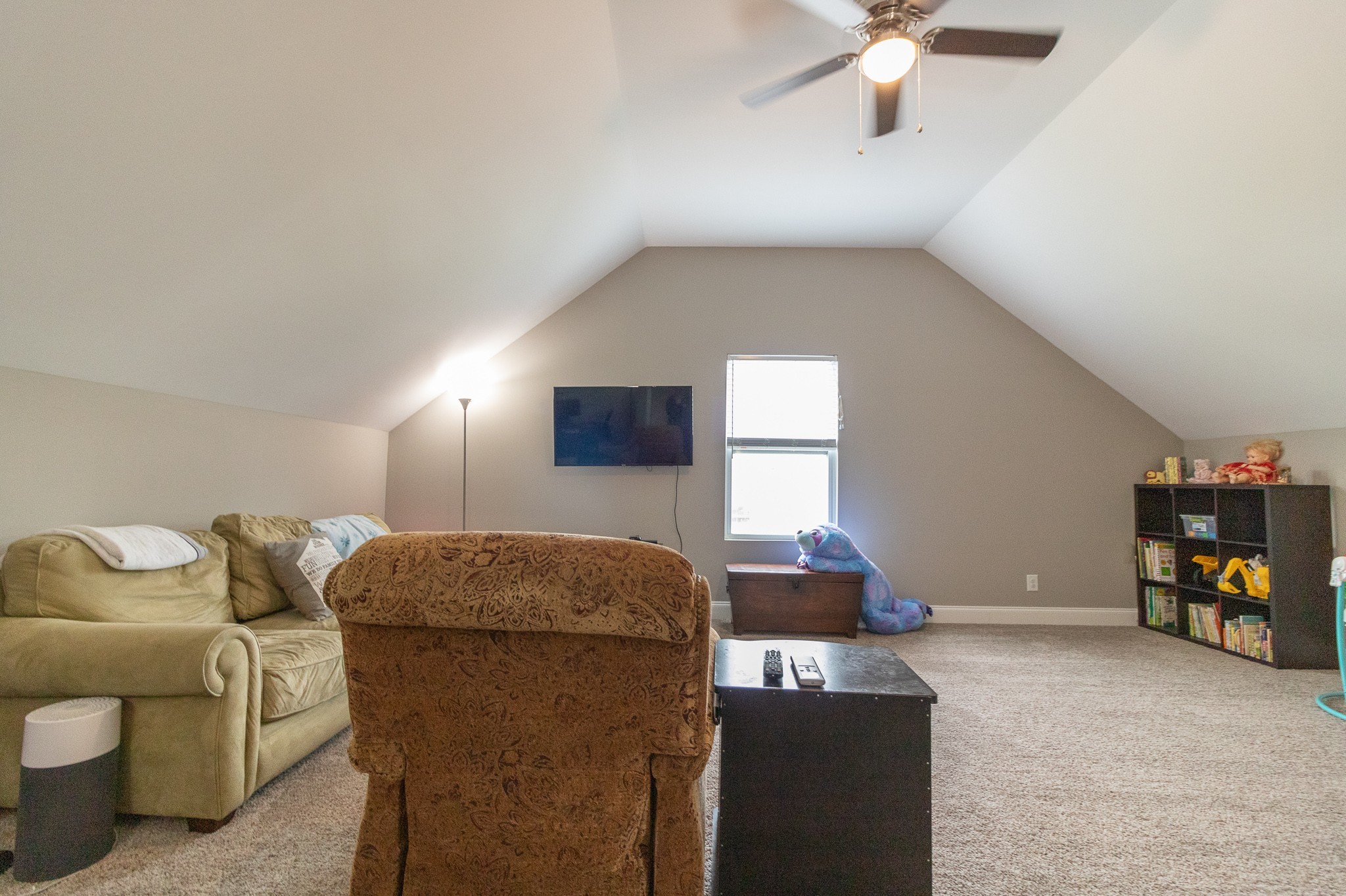 167 Fieldstone Lane Springfield, TN 37172 - Photo 27 of 36 a living room with furniture and a flat screen tv