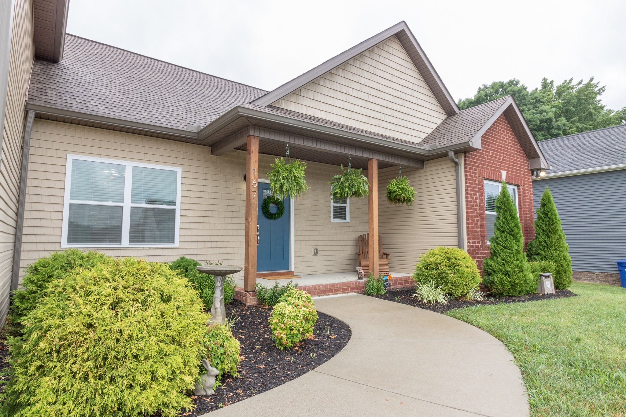 167 Fieldstone Lane Springfield, TN 37172 - Photo 3 of 36 a front view of a house with garden