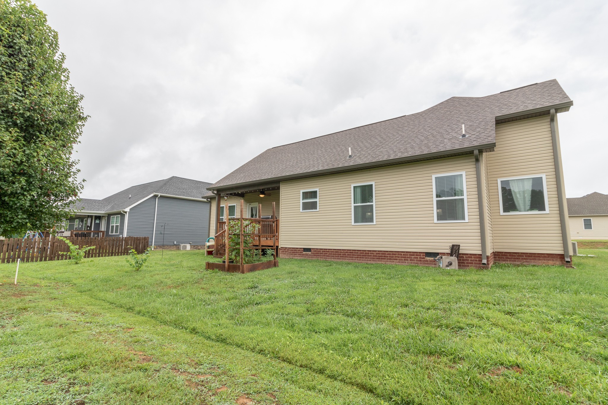 167 Fieldstone Lane Springfield, TN 37172 - Photo 35 of 36 a house view with a sitting space and garden