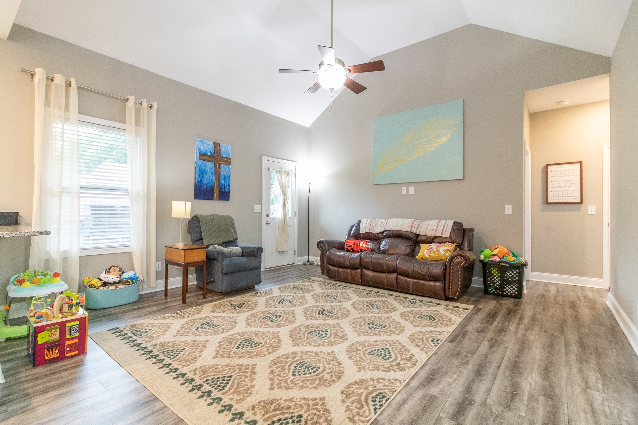 167 Fieldstone Lane Springfield, TN 37172 - Photo 7 of 36 a living room with furniture and a window