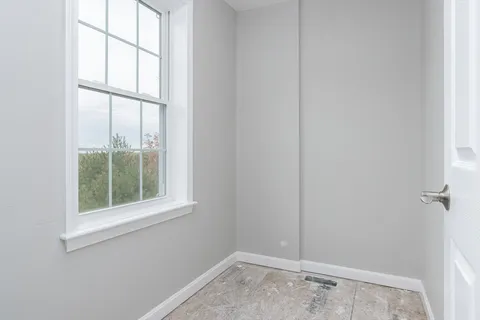 a view of a window in an empty room