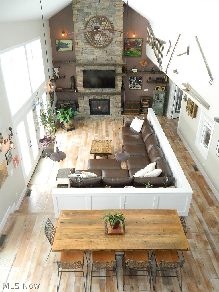 12464 Hotchkiss Road Burton, OH 44021 - Photo 4 of 35 Once Inside the Breathtaking Two Story Great Room and Dine In Kitchen Greets You and Welcomes You! Warm Walnut Floors Throughout the 1st and 2nd Floors, Floor to Ceiling Windows Brings in the Sunshine - Amazing!