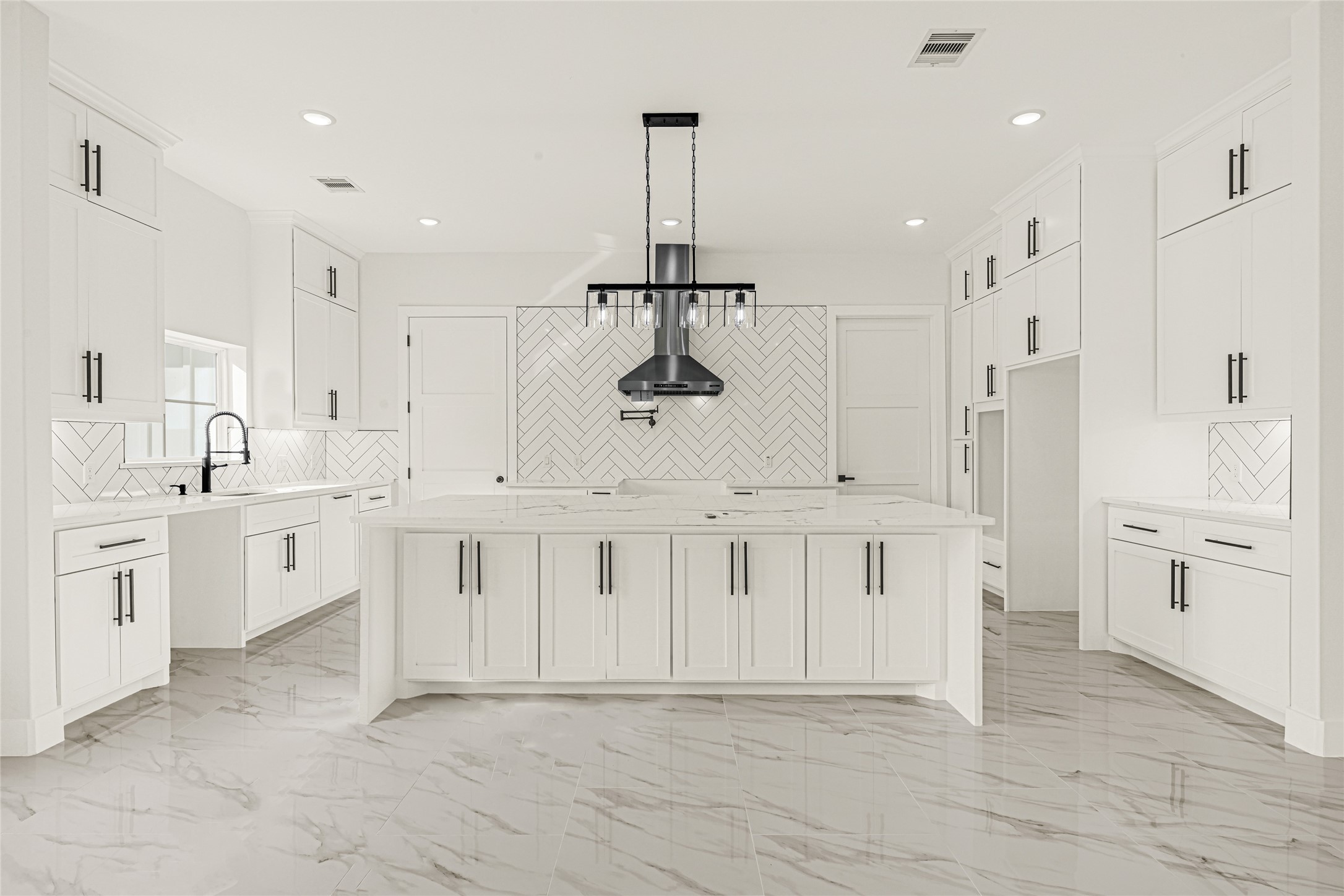 16915 Hamill Drive Rosharon, TX 77583 - Photo 23 of 47 a kitchen with white cabinets and white appliances