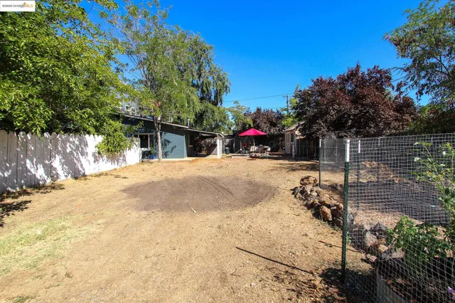 a view of swimming pool with a patio