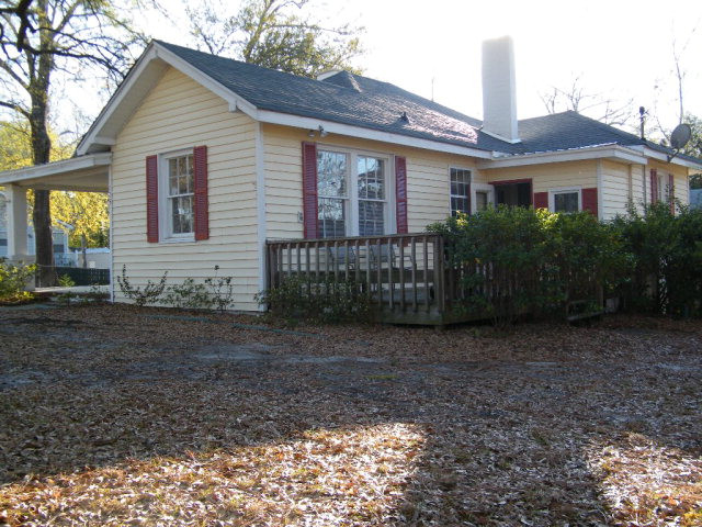123 Jasper Street Southwest Aiken, SC 29801 - Photo 12 of 15 a front view of a house with garden