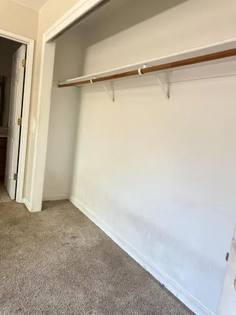 a view of small space with racks on the wall