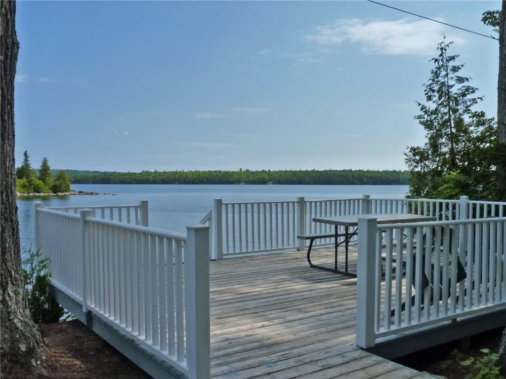 909 Macomber Mill Road Eastbrook, ME 04634 - Photo 6 of 27 Deck is right at waters edge with...