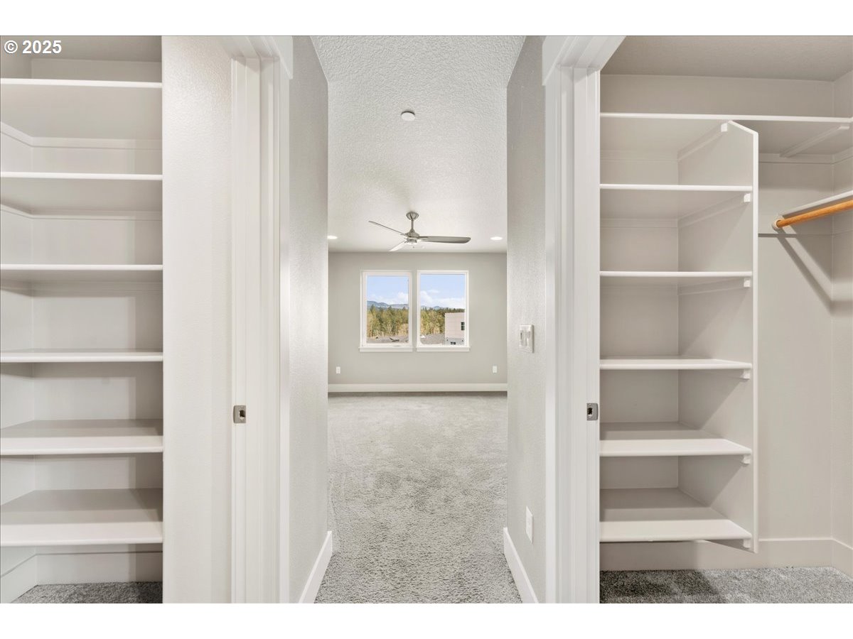 6452 Northwest Lambert Lane Camas, WA 98607 - Photo 23 of 43 a view of an empty room with cabinet