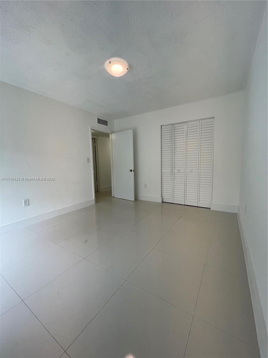10802 Southwest 88th Street, Unit P2 Miami, FL 33176 - Photo 11 of 23 a view of empty room