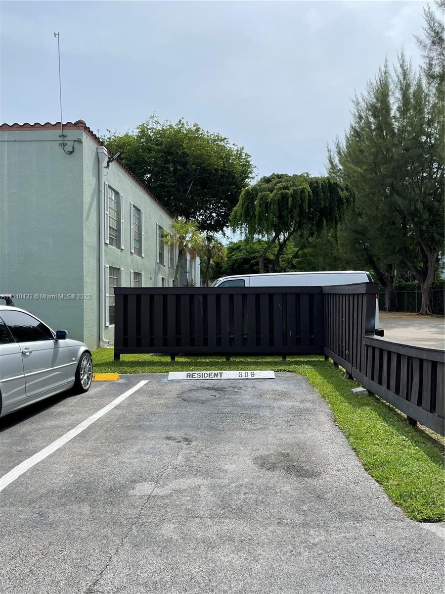 10802 Southwest 88th Street, Unit P2 Miami, FL 33176 - Photo 17 of 23 a view of a backyard with a garden and entertaining space