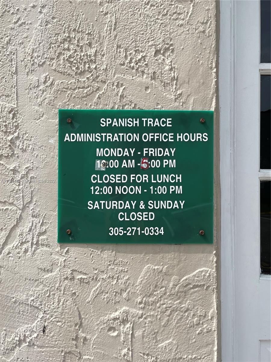 10802 Southwest 88th Street, Unit P2 Miami, FL 33176 - Photo 23 of 23 a sign on the side of a building