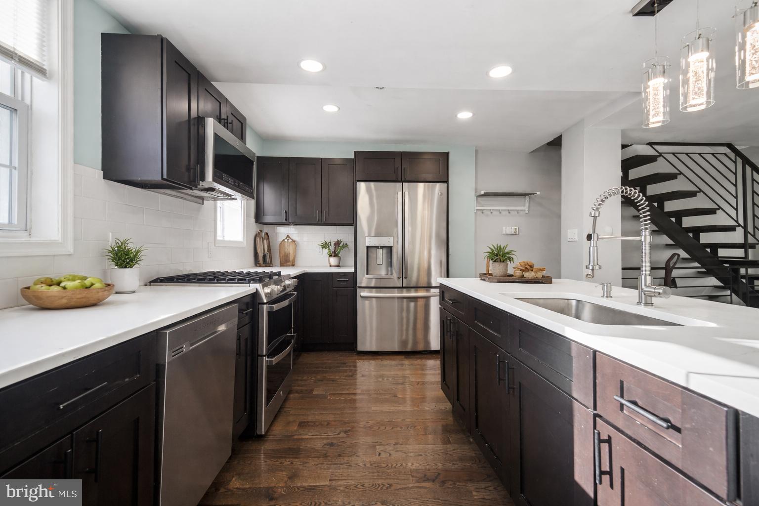 1607 South 28th Street Philadelphia, PA 19145 - Photo 3 of 11 Sleek modern kitchen with elegant finishes.