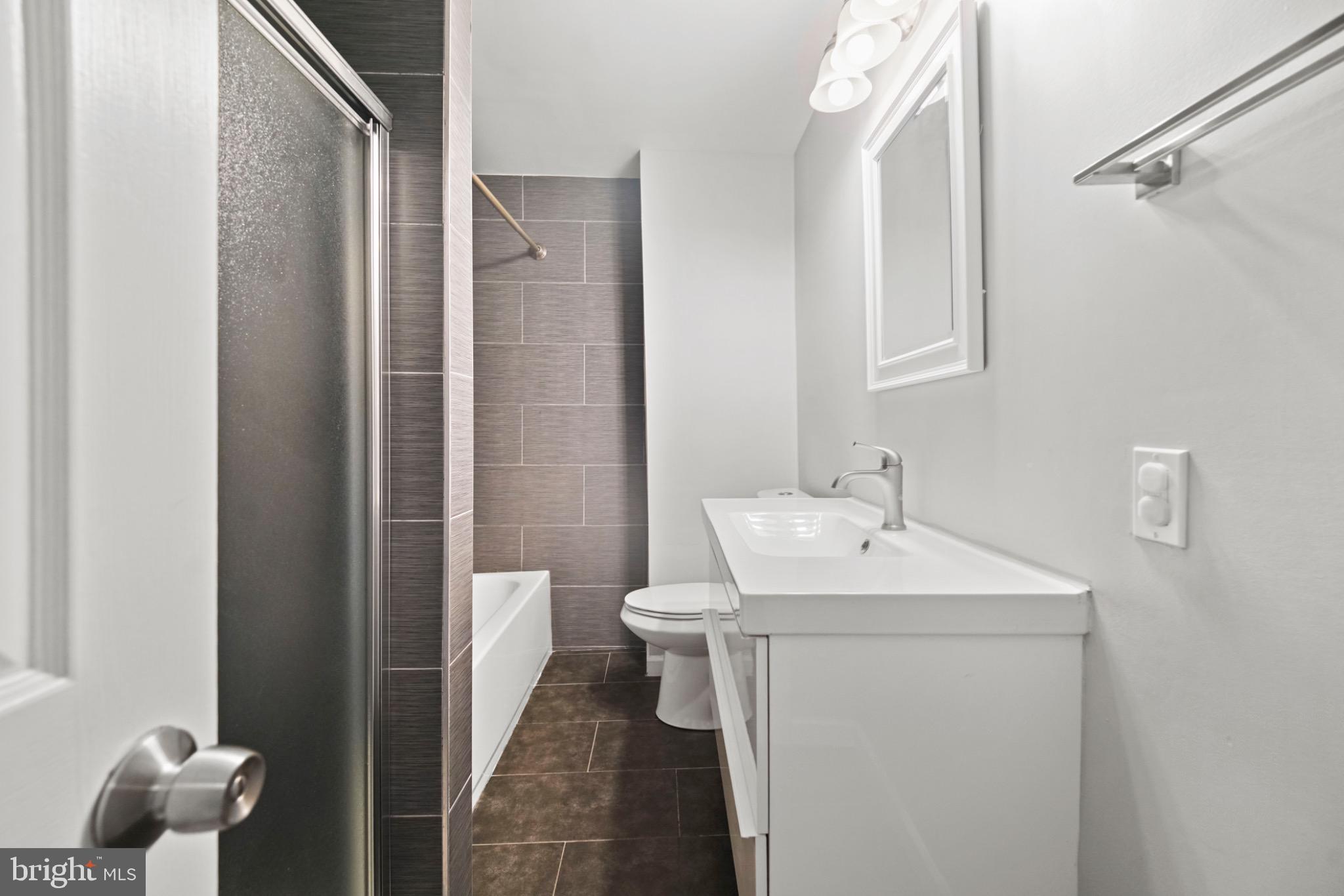 1607 South 28th Street Philadelphia, PA 19145 - Photo 10 of 11 Modern bathroom with sleek finishes.