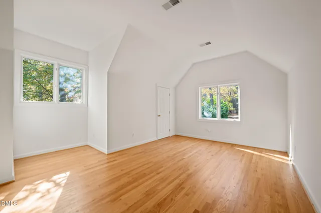a view of a room with wooden walls