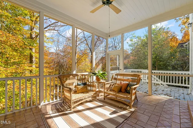 a view of a city with lush green forest