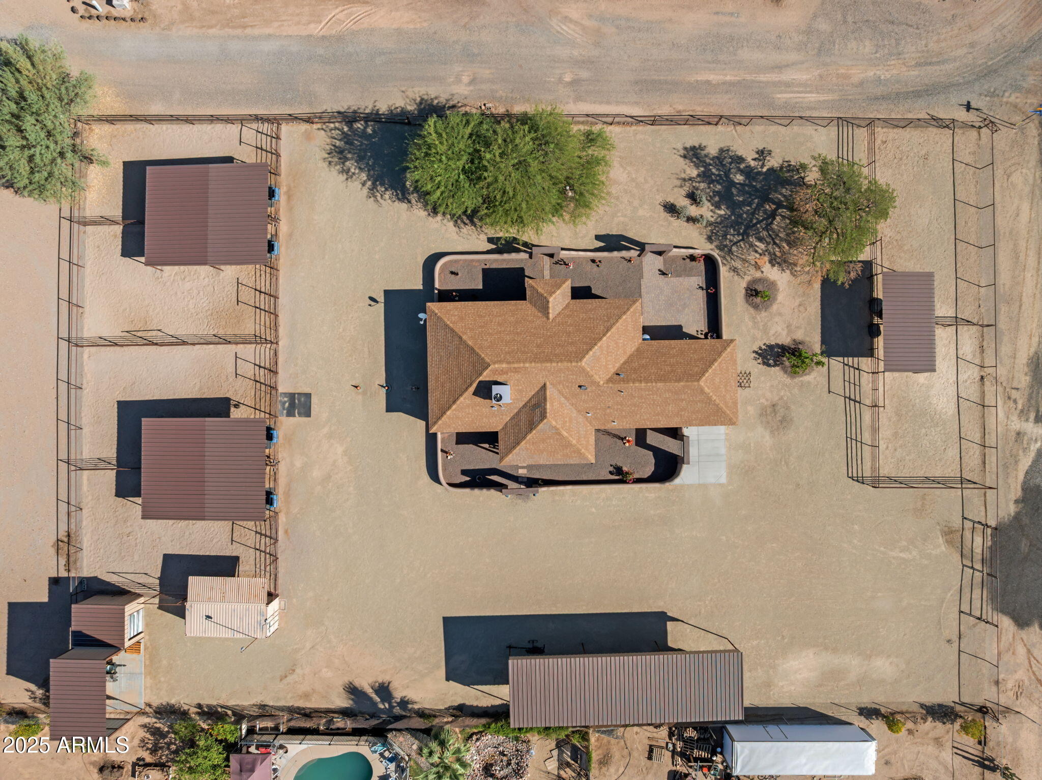22309 West Rancho Caliente Wittmann, AZ 85361 - Photo 1 of 44 an aerial view of residential houses with outdoor space