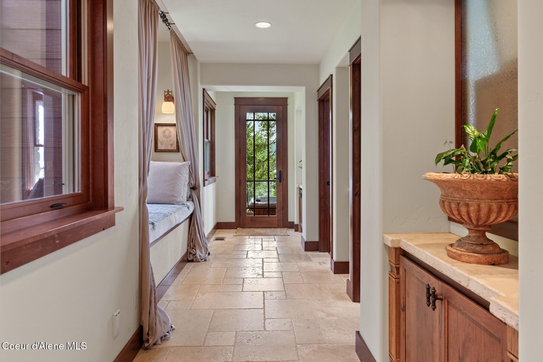 865 East Pine Ridge Drive Harrison, ID 83833 - Photo 41 of 76 Lower level Hallway to Deck
