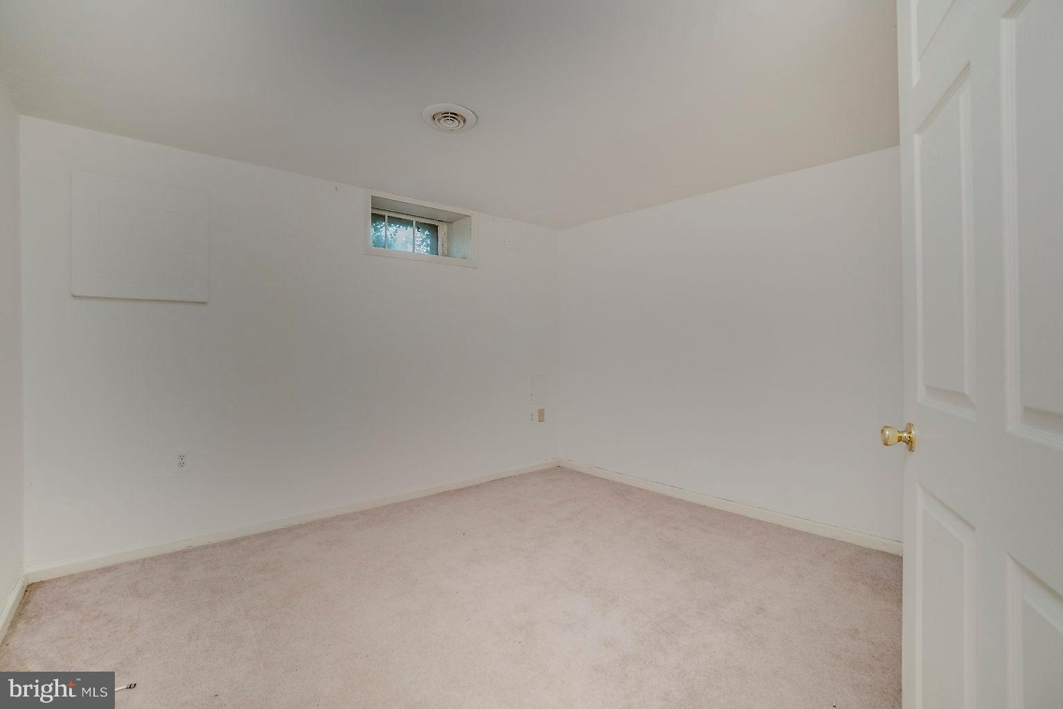 5219 Hillwell Road Baltimore, MD 21229 - Photo 19 of 44 Basement bedroom