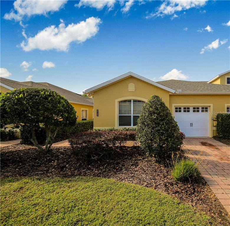 2727 Rutledge Court Winter Haven, FL 33884 - Photo 1 of 1 Exterior view of stone paver driveway and 1 car garage.