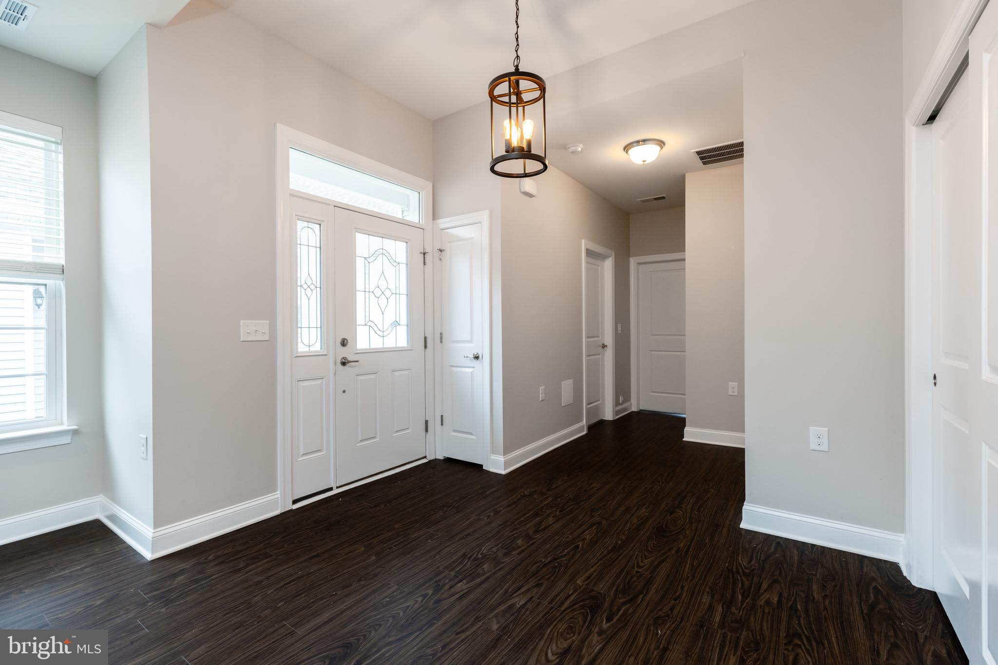 1415 Whispering Woods Road Middletown, DE 19709 - Photo 11 of 42 a view of a room with wooden floor and window